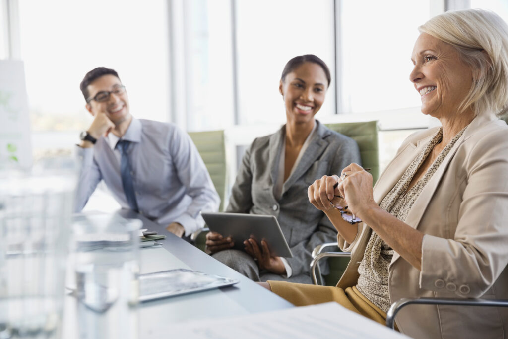 Business colleagues discussing in boardroom